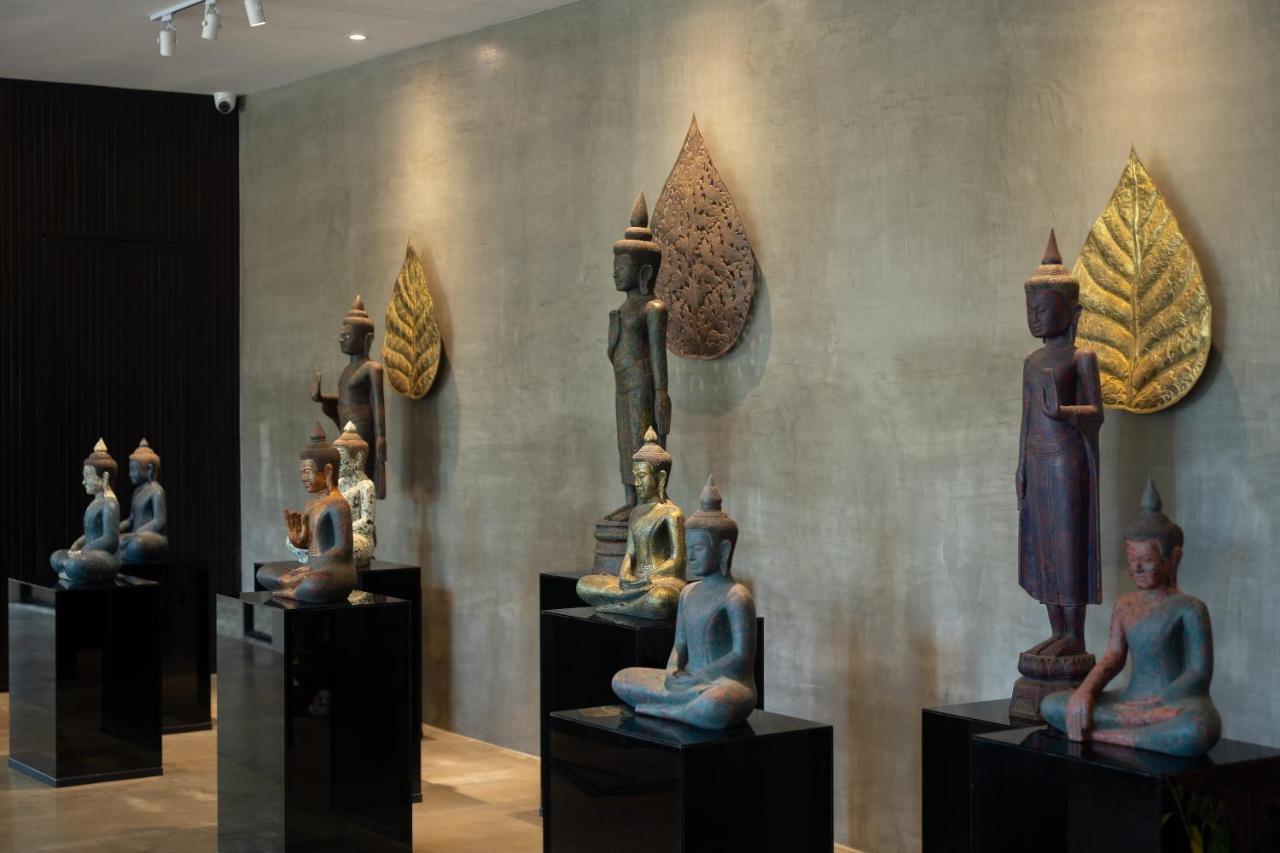 Eightfold Urban Resort Siem Reap Esterno foto A collection of Thai and Laotian art