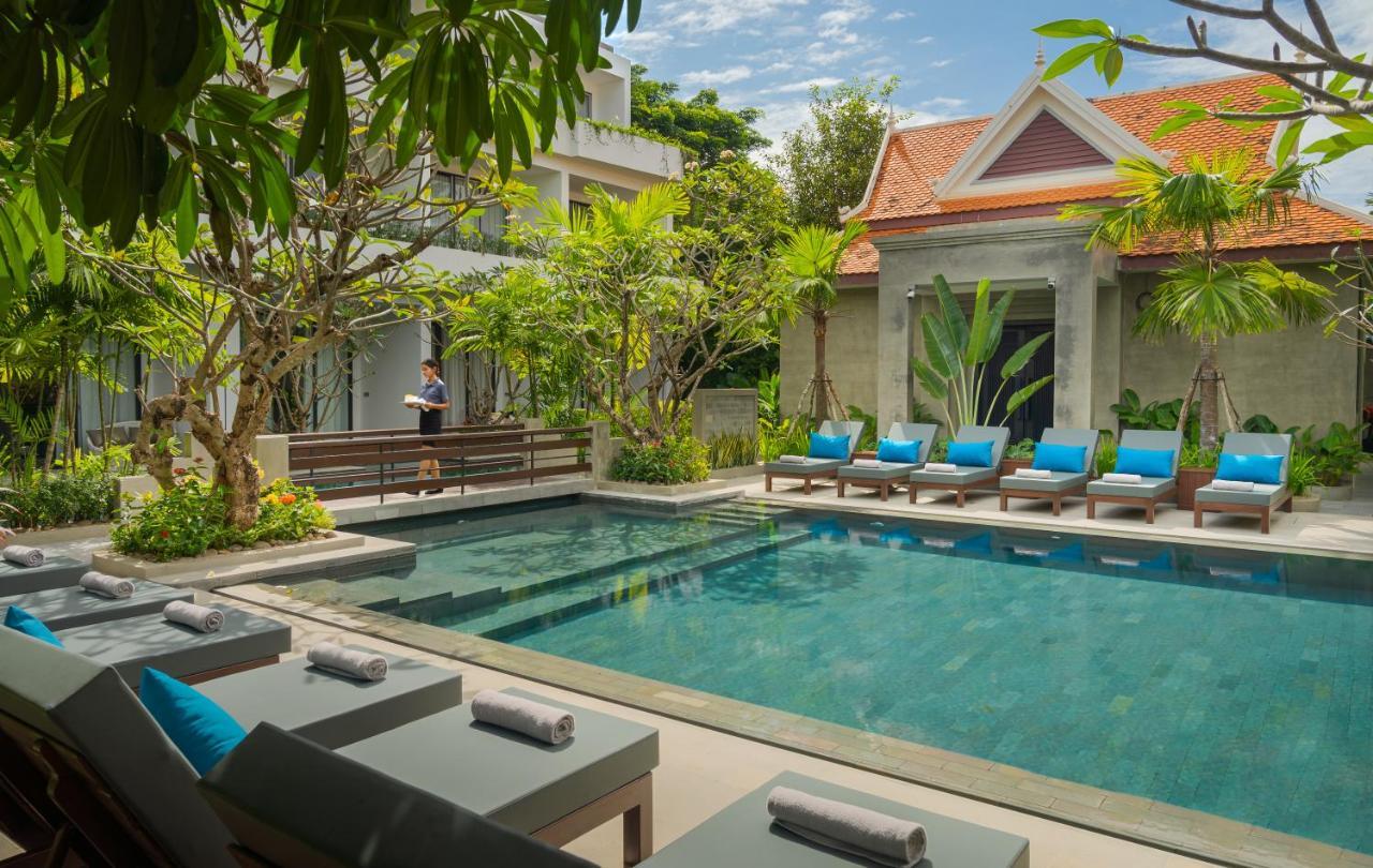 Eightfold Urban Resort Siem Reap Esterno foto The swimming pool at The Library