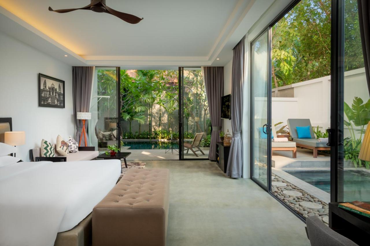 Eightfold Urban Resort Siem Reap Esterno foto A pool villa at The Village Phuket